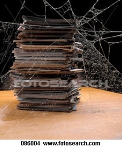 books-covered-cobwebs